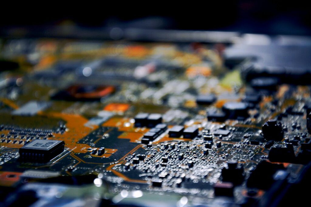 Home Detailed close-up view of electronic circuit board, showcasing modern technology.